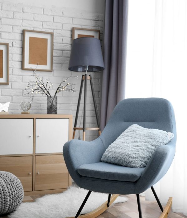Living,Room,Interior,With,Grey,Rocking,Chair,And,Pillow